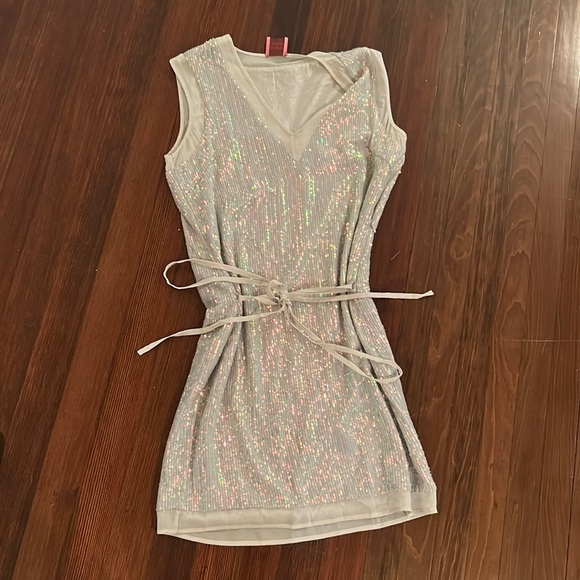 This is a silver sequined dress from Juliette Longuet in a size XS. - Picture 2 of 3